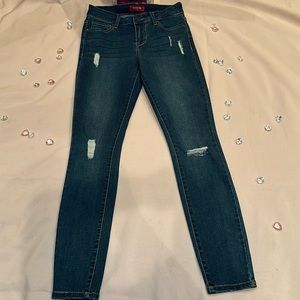Women’s GUESS denim jeans size 26 skinny mid-rise destroyed jeans